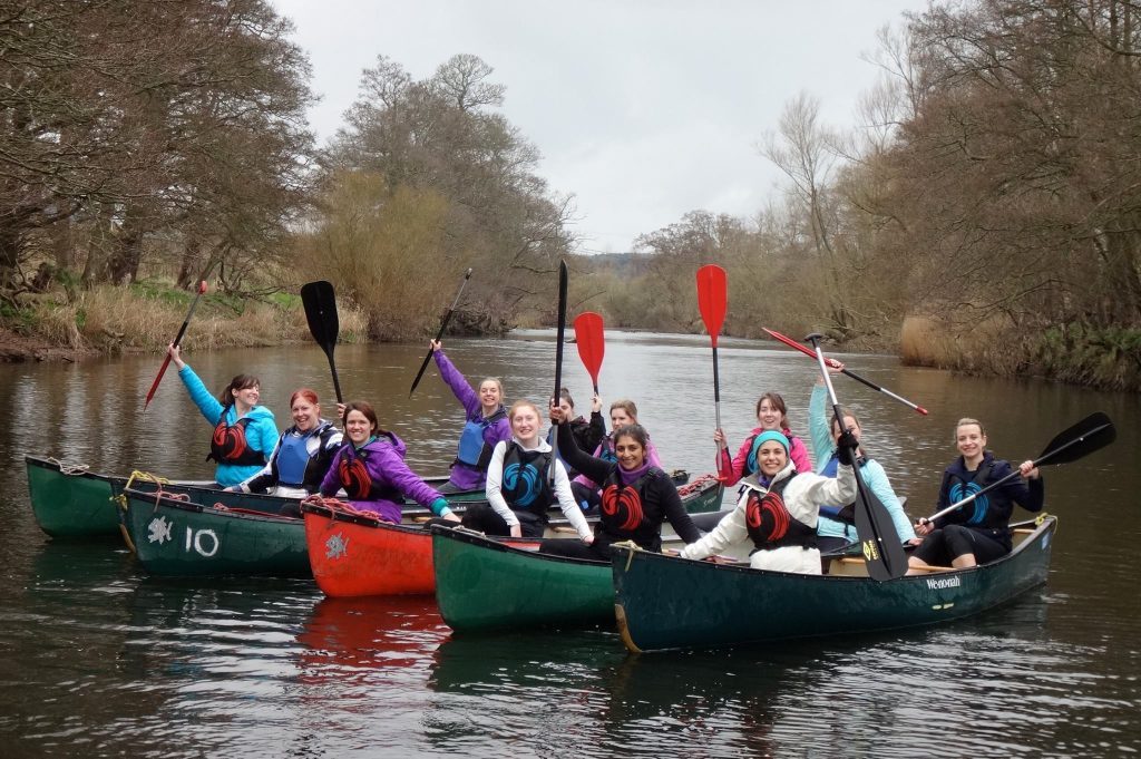 Group of ladies open canoe adventure
